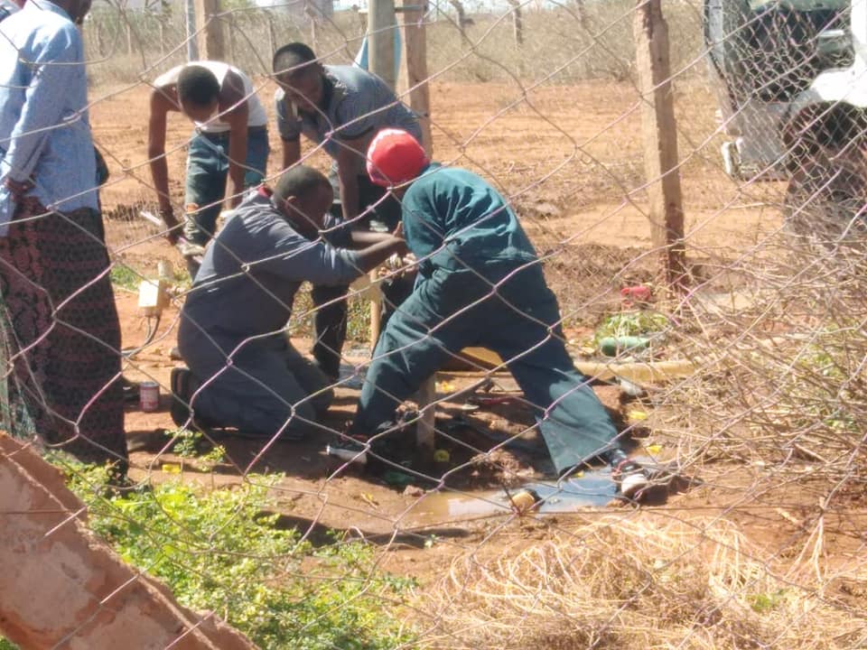 Borehole Maintenance Team On Site